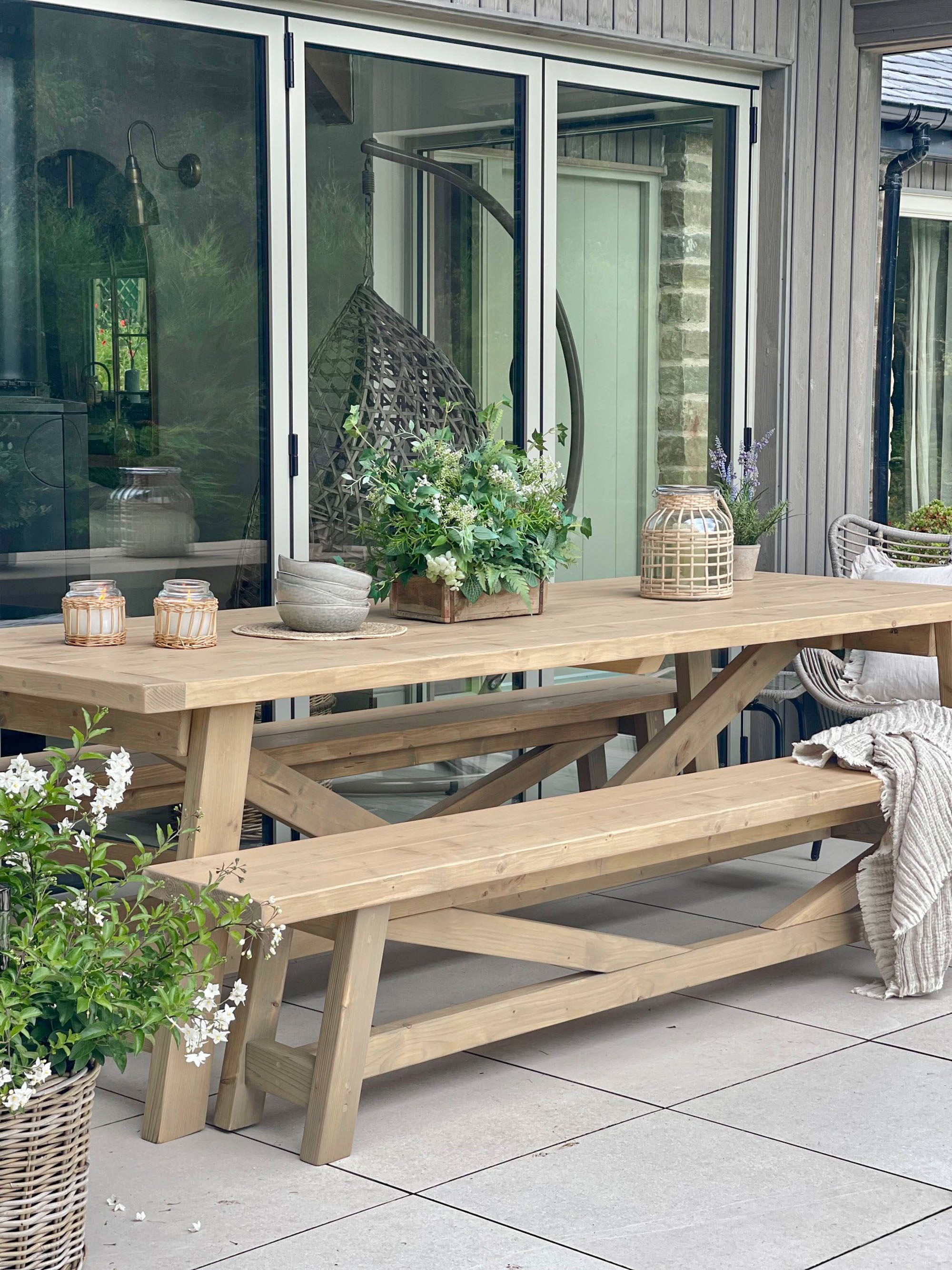 Outdoor dining table with shop bench